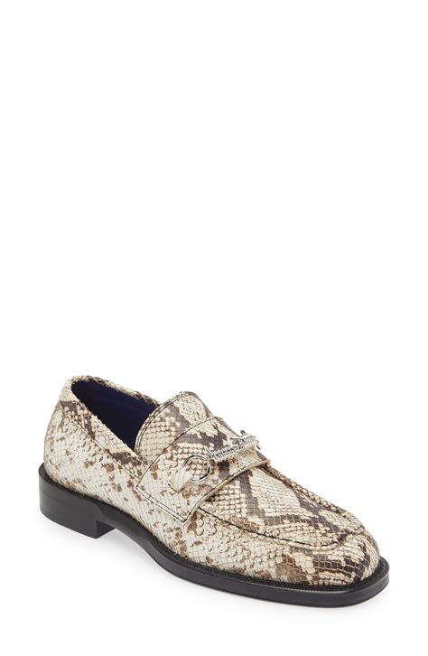 barbed snakeskin loafers.